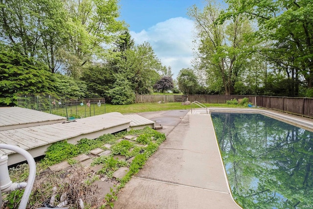 4207 Lance Ct, Kokomo, IN 46902 - view of swimming pool featuring a deck and view of scattered trees