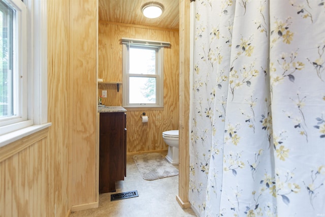 59000 Crumstown Hwy, North Liberty, IN 46554 - bathroom with toilet, vanity, and curtained shower
