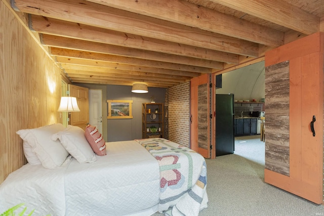 59000 Crumstown Hwy, North Liberty, IN 46554 - bedroom with freestanding refrigerator, light carpet, beam ceiling, and wood walls