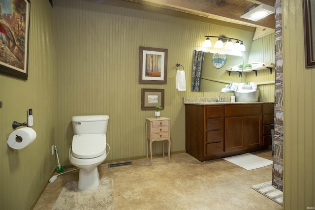 59000 Crumstown Hwy, North Liberty, IN 46554 - bathroom with toilet, vanity, and baseboards