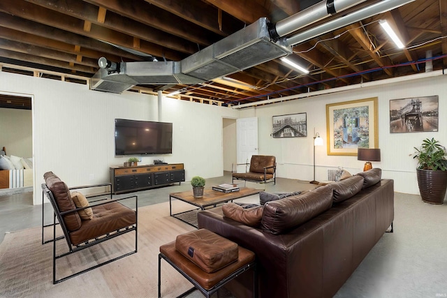 59000 Crumstown Hwy, North Liberty, IN 46554 - living area featuring concrete floors and a baseboard radiator