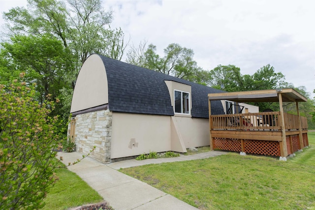 59000 Crumstown Hwy, North Liberty, IN 46554 - view of home's exterior featuring a shingled roof, a lawn, and stone siding