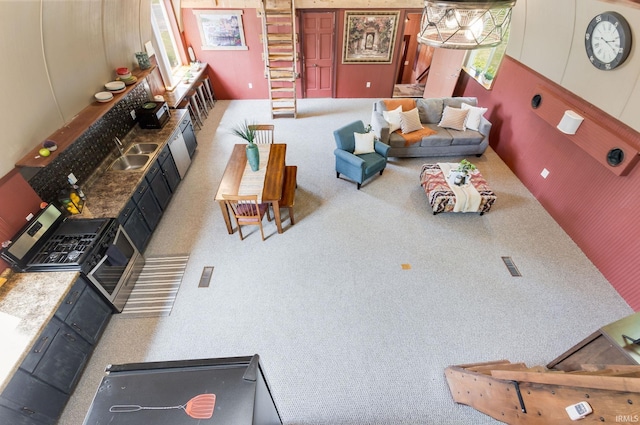 59000 Crumstown Hwy, North Liberty, IN 46554 - carpeted living area featuring a sink