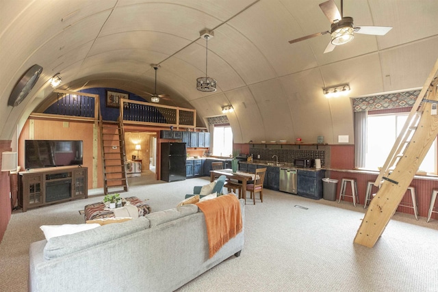 59000 Crumstown Hwy, North Liberty, IN 46554 - living area with ceiling fan, light carpet, and vaulted ceiling