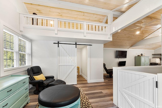 14612 Liberty Mills Rd, Fort Wayne, IN 46814 - living area featuring a barn door, ceiling fan, wood finished floors, wooden ceiling, and baseboards