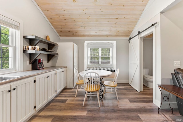 14612 Liberty Mills Rd, Fort Wayne, IN 46814 - dining area with wood ceiling, a barn door, vaulted ceiling, plenty of natural light, and wood finished floors
