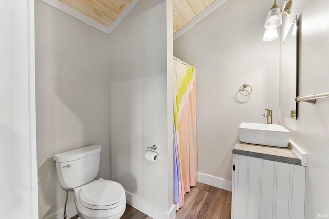 14612 Liberty Mills Rd, Fort Wayne, IN 46814 - full bath featuring toilet, wood finished floors, baseboards, vaulted ceiling, and wood ceiling