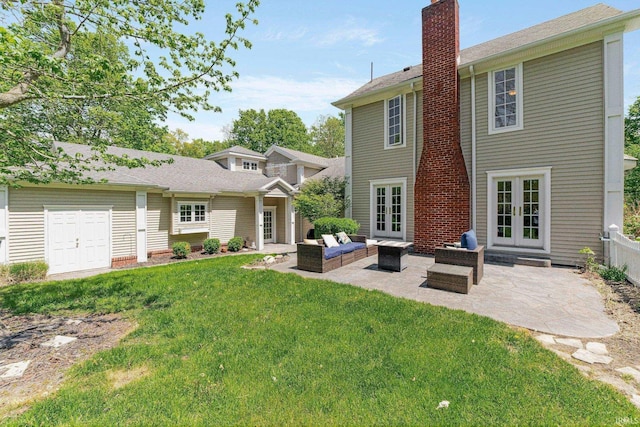 14612 Liberty Mills Rd, Fort Wayne, IN 46814 - back of property with french doors, a lawn, a chimney, a patio, and an outdoor living space