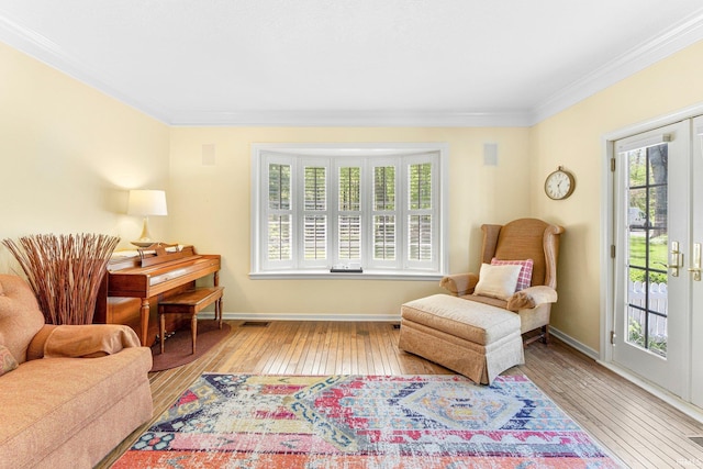 14612 Liberty Mills Rd, Fort Wayne, IN 46814 - sitting room with wood-type flooring, healthy amount of natural light, ornamental molding, and baseboards