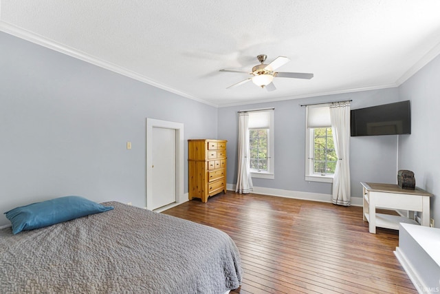 14612 Liberty Mills Rd, Fort Wayne, IN 46814 - bedroom with hardwood / wood-style floors, ornamental molding, ceiling fan, and baseboards