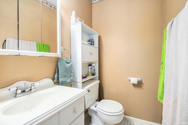 1612 W Grant St, Bremen, IN 46506 - half bathroom featuring toilet, tile patterned floors, and vanity