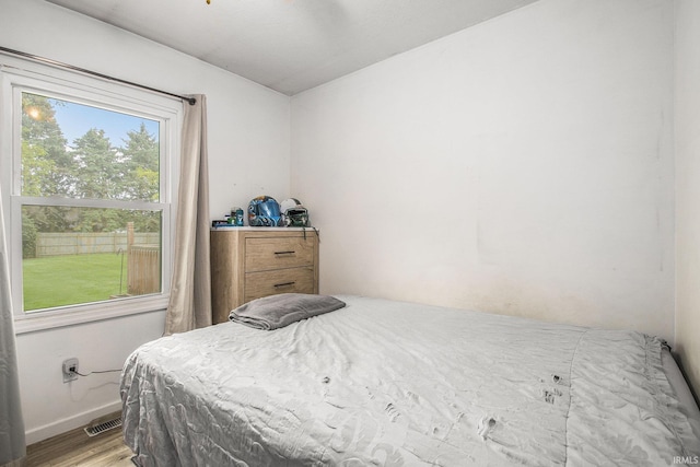 1612 W Grant St, Bremen, IN 46506 - bedroom featuring light wood-style flooring and baseboards