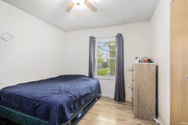 1612 W Grant St, Bremen, IN 46506 - bedroom featuring light wood-style flooring and ceiling fan