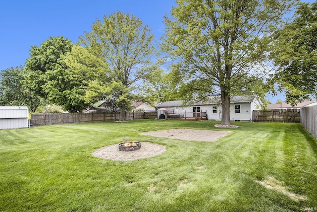 1612 W Grant St, Bremen, IN 46506 - view of yard with an outdoor fire pit and a deck