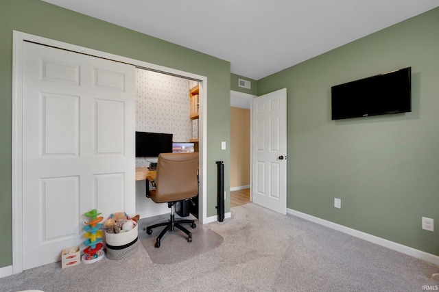 office area with carpet flooring and baseboards