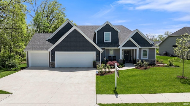 111 Big Rock Pass, Huntertown, IN 46748 - craftsman inspired home with a garage, a front lawn, stone siding, concrete driveway, and board and batten siding