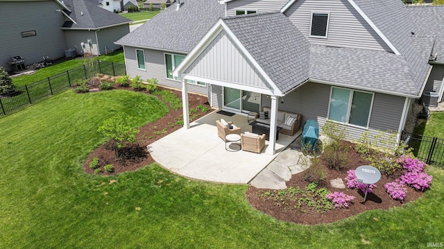 111 Big Rock Pass, Huntertown, IN 46748 - back of house featuring board and batten siding, roof with shingles, an outdoor hangout area, a patio, and a residential view