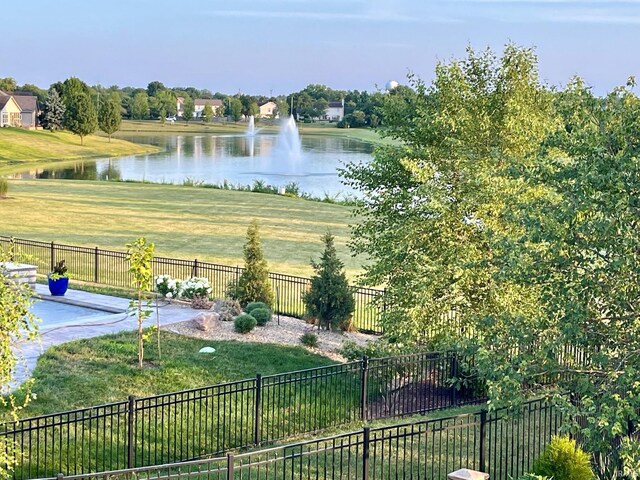water view featuring fence
