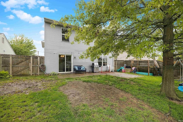 116 El Dorado Trl W, Fort Wayne, IN 46825 - back of property with a patio area and a gate