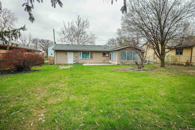 back of house with a patio