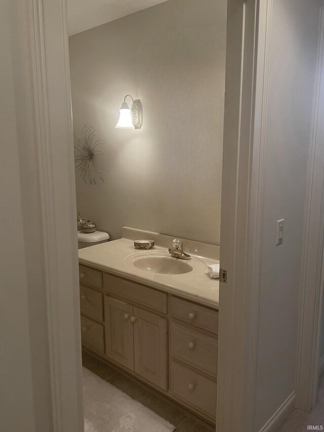 12116 Autumn Breeze Dr, Fort Wayne, IN 46845 - half bathroom with vanity and tile patterned flooring