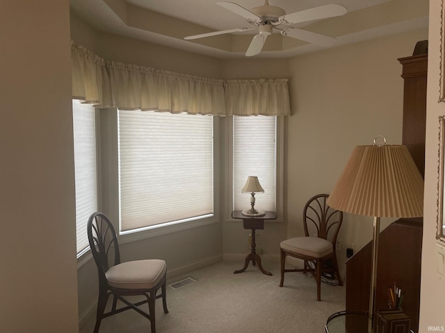 12116 Autumn Breeze Dr, Fort Wayne, IN 46845 - living area with carpet floors, ceiling fan, and baseboards