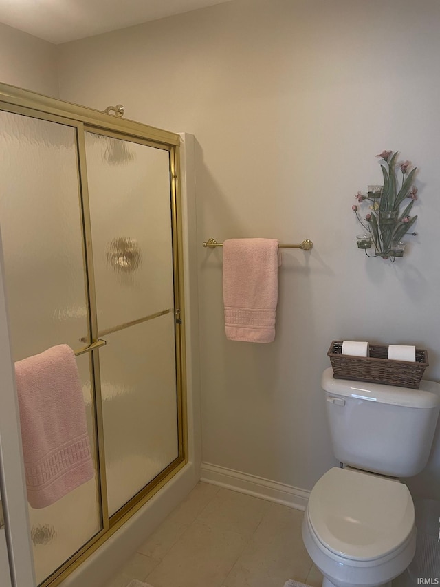 12116 Autumn Breeze Dr, Fort Wayne, IN 46845 - full bath with baseboards, toilet, a shower stall, and tile patterned flooring