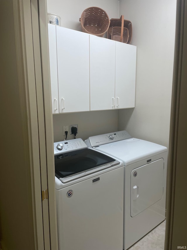 12116 Autumn Breeze Dr, Fort Wayne, IN 46845 - clothes washing area with cabinet space and separate washer and dryer