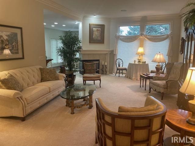12116 Autumn Breeze Dr, Fort Wayne, IN 46845 - living area with light carpet, crown molding, and a fireplace