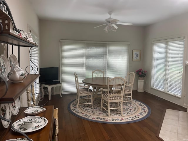 12116 Autumn Breeze Dr, Fort Wayne, IN 46845 - dining area with ceiling fan, wood finished floors, and baseboards