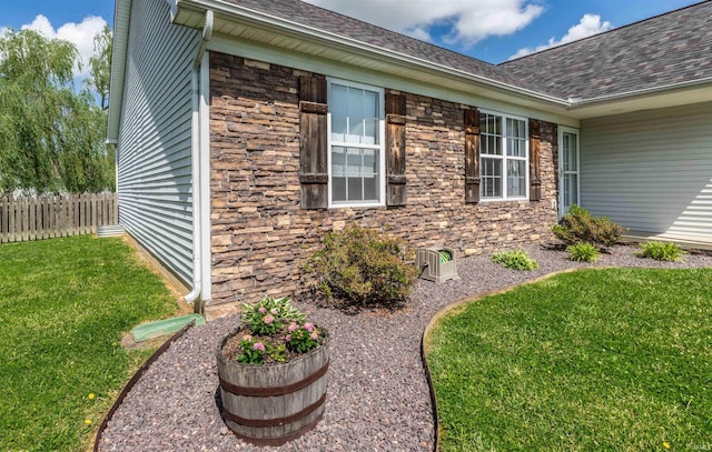 11430 Kestrel Ct, Evansville, IN 47725 - view of home's exterior with stone siding and a shingled roof