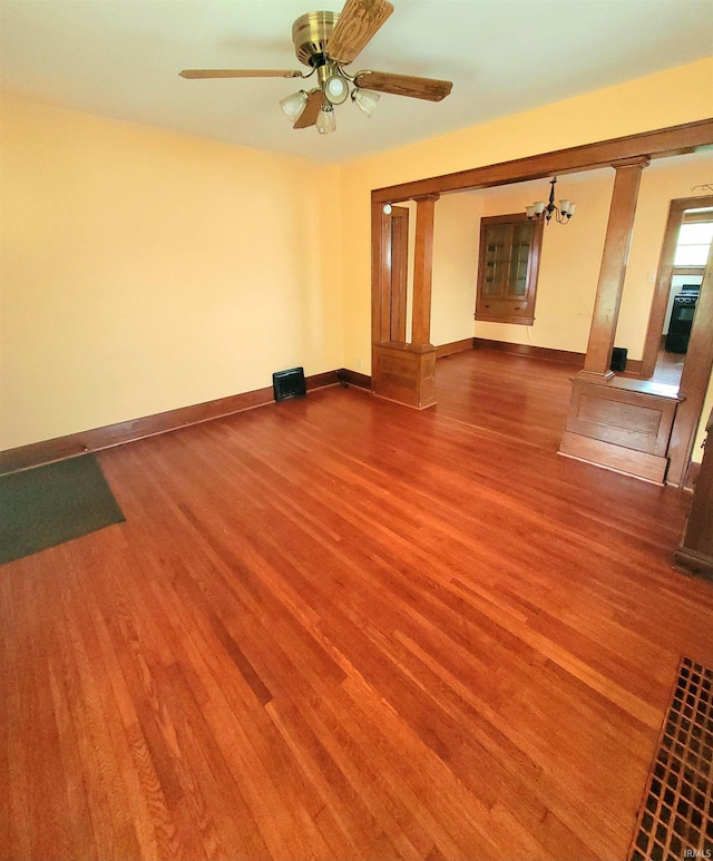 625 S 29th St, Lafayette, IN 47904 - unfurnished living room featuring wood finished floors, baseboards, and ceiling fan