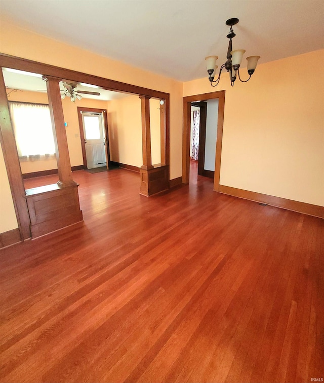 625 S 29th St, Lafayette, IN 47904 - spare room featuring a chandelier, baseboards, and wood finished floors