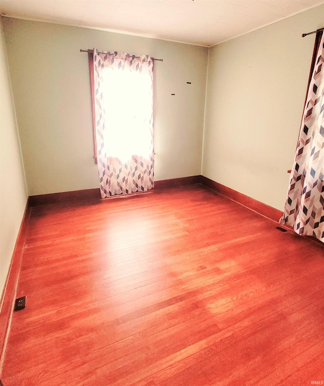 625 S 29th St, Lafayette, IN 47904 - spare room with wood finished floors and baseboards