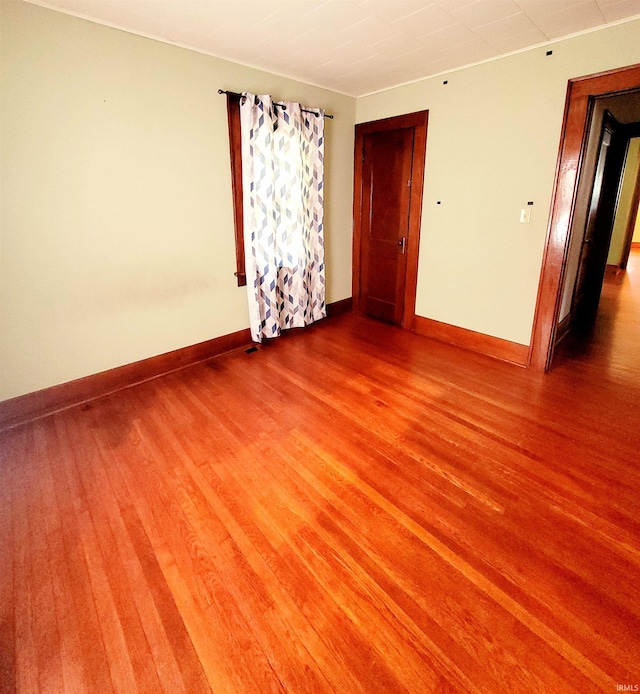 625 S 29th St, Lafayette, IN 47904 - spare room featuring baseboards and wood finished floors