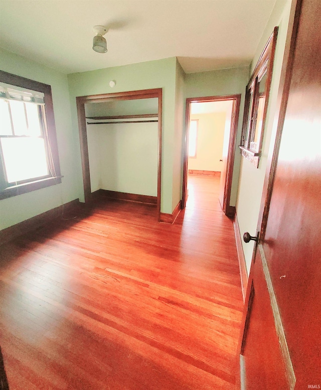625 S 29th St, Lafayette, IN 47904 - unfurnished bedroom featuring light wood-style floors, baseboards, and a closet