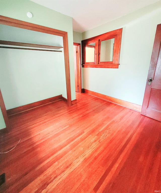 625 S 29th St, Lafayette, IN 47904 - unfurnished bedroom with wood finished floors, baseboards, and a closet