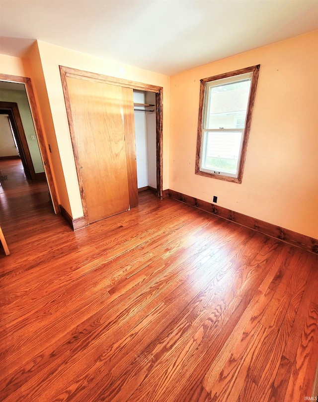 625 S 29th St, Lafayette, IN 47904 - unfurnished bedroom featuring baseboards, wood finished floors, and a closet