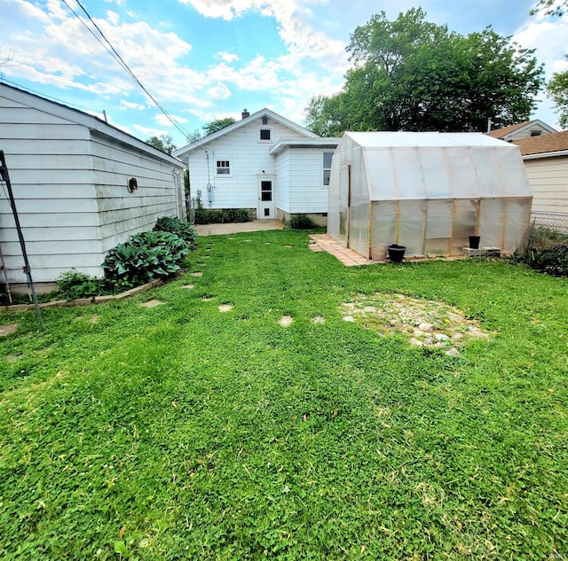 625 S 29th St, Lafayette, IN 47904 - view of green lawn with an exterior structure and an outdoor structure