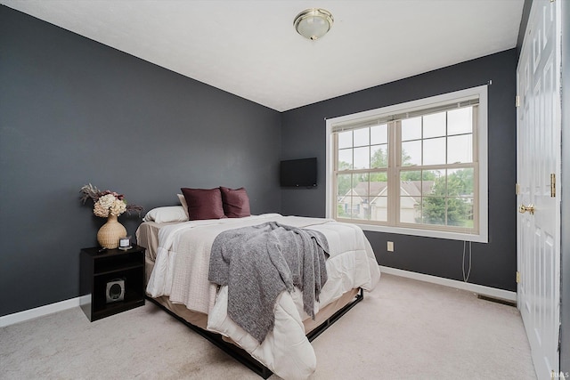 2507 Audri Ln, Kokomo, IN 46901 - bedroom with baseboards and light carpet
