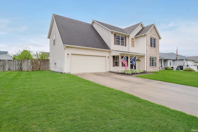 2507 Audri Ln, Kokomo, IN 46901 - traditional-style home with driveway, a garage, and a porch
