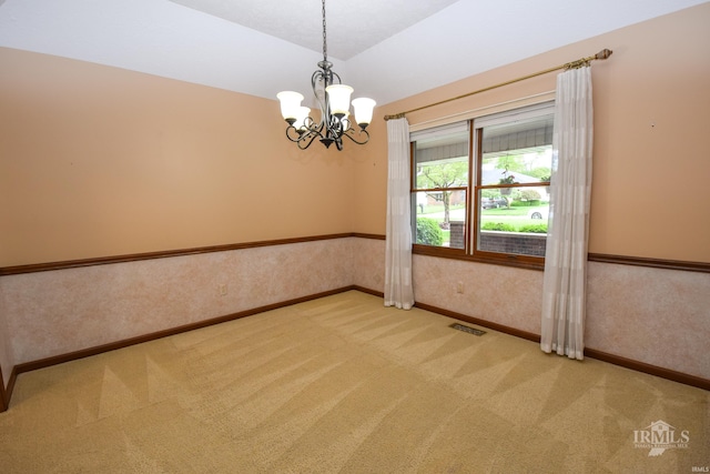 4105 W Friar Dr, Muncie, IN 47304 - spare room with carpet flooring, a chandelier, baseboards, and lofted ceiling
