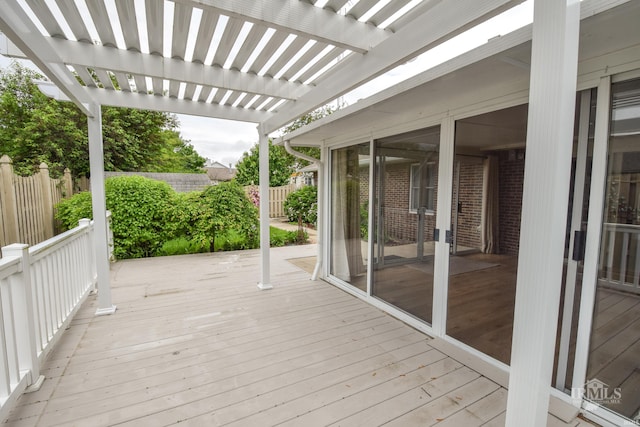 4105 W Friar Dr, Muncie, IN 47304 - deck featuring a sunroom, fence, and a pergola
