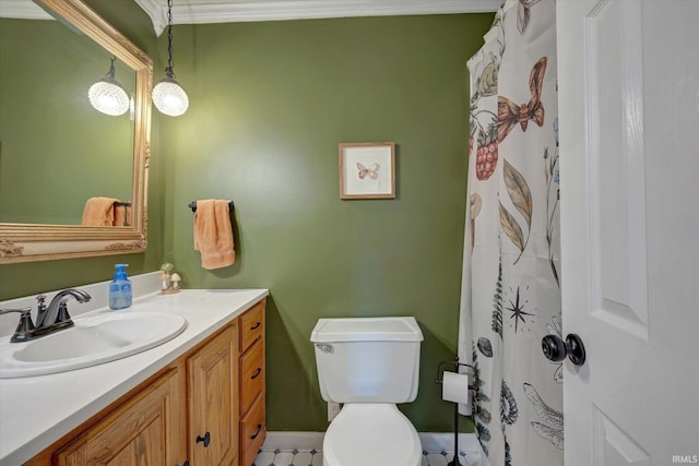 bathroom with vanity, toilet, and curtained shower