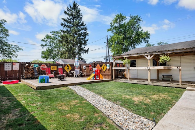 1134 N 14th St, Lafayette, IN 47904 - view of yard with a wooden deck and a playground