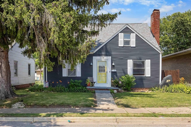 1134 N 14th St, Lafayette, IN 47904 - view of front of property featuring a chimney and a shingled roof