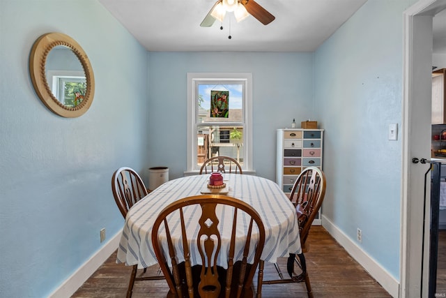 1134 N 14th St, Lafayette, IN 47904 - dining space featuring ceiling fan, baseboards, and dark wood finished floors