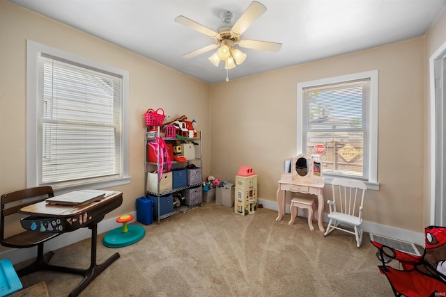 1134 N 14th St, Lafayette, IN 47904 - game room featuring carpet, a ceiling fan, and baseboards