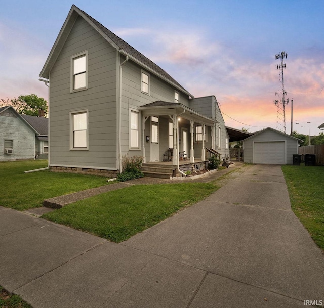 1919 Pierce St, Lafayette, IN 47904 - view of front of property featuring a porch, an outbuilding, concrete driveway, a garage, and a front yard