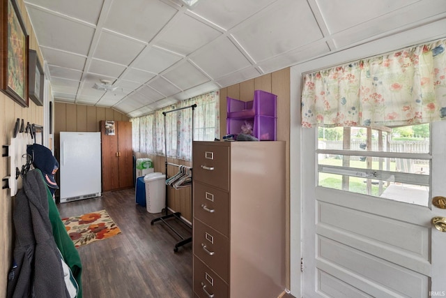 1919 Pierce St, Lafayette, IN 47904 - home office featuring dark wood-style floors, wood walls, and vaulted ceiling